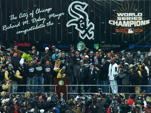 The Chicago White Sox celebrate winning the 2005 World Series, with CEG banner backdrop